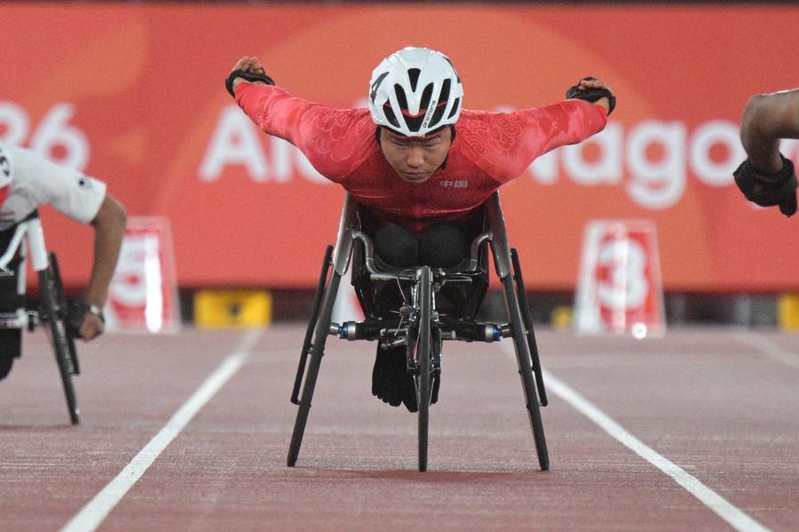 19일 '제5회 아이치·나고야 아시안 패러게임' 육상 남자 100m T53등급 예선전이 일본 나고야에서 열렸다. 이날 경기 중인 중국의 양사오차오(楊少橋) 선수. (사진/신화통신)
